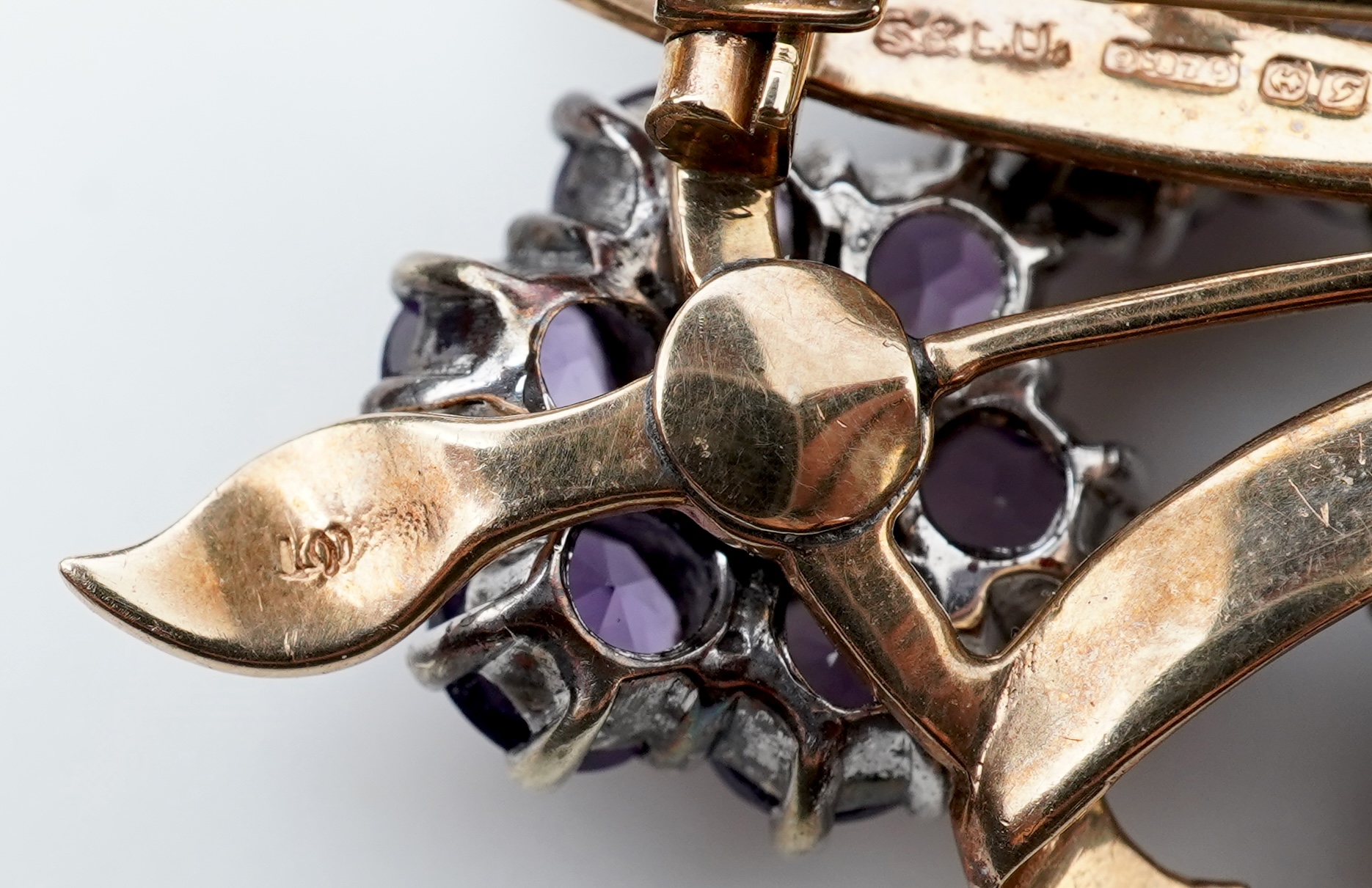 A Retro amethyst and diamond brooch, circa 1956